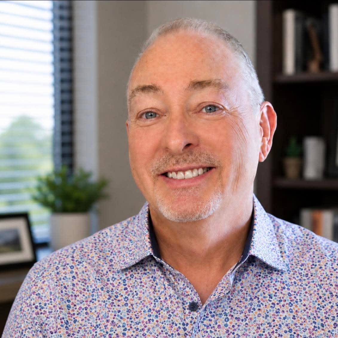 David McLemore smiling in his office